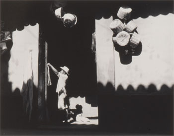 Untitled (Vendor and shadows, Mexico City), 1960